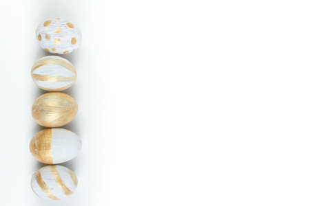 Happy Easter. Painted eggs on isolated white background. top view. Copy space for textの写真素材