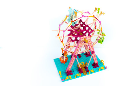 Developing childrens designer. Ferris wheel with puppet men. Isolated on white background. Lego.のeditorial素材