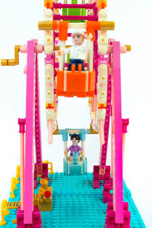 Developing childrens designer. Ferris wheel with puppet men. Isolated on white background. Lego.のeditorial素材