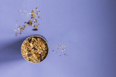 Homemade granola on the violet backgroundの写真素材