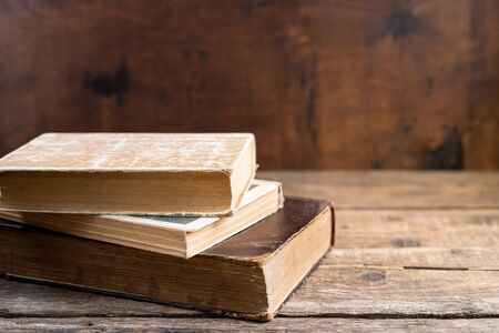 Old books on wooden shelf. Education learning concept with old book in library. Copy spaceの写真素材