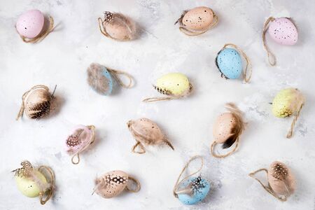 Decorative Easter eggs on stone background. Easter background. Pattern of Easter eggs top view