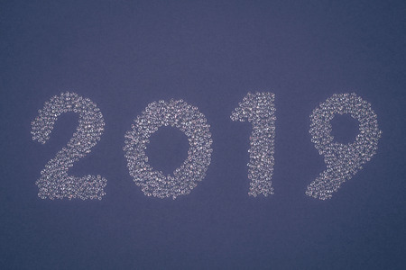 New year 2019 made of beautiful white sparkling strass on blue background.の写真素材
