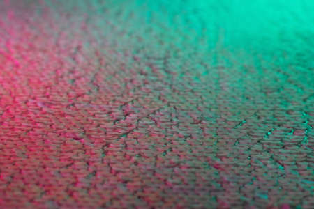 Colorful abstract sequins  in neon light.