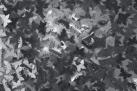 Abstract trendy blue butterfly shaped confetti background. Color of the year 2020 concept. Flat lay. Copy space.の写真素材