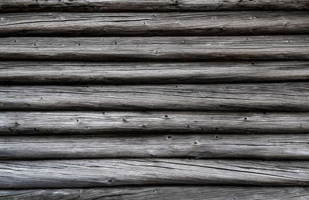 Rustic old wooden logs texture natural background. Dark wood background natural texture. Vintage grey pattern for decoration design. Home decor. Copy space.の写真素材