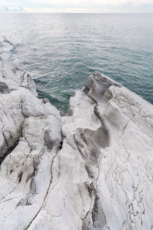 Beautiful seascape with white rock formation on cloudy day. Beautiful landscape. Natural background.の写真素材
