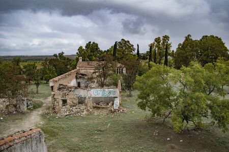 Graffiti and ruins in abandoned farmhouseの写真素材