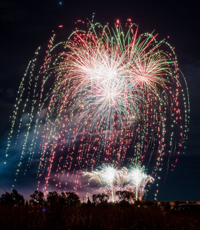 Fireworks of different colors with the black background