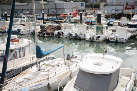 Mooring of sailboats in sea harbor stock photoの写真素材