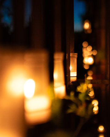 Illuminated Candle in the Darknessの写真素材