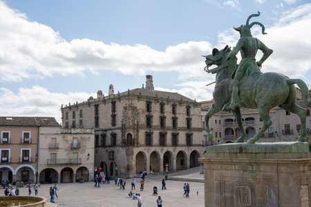 Statue of Mythical Creature in Town Square. Trujillo: August 6th 2023: Green Dragon with Long Neck and Tailの写真素材