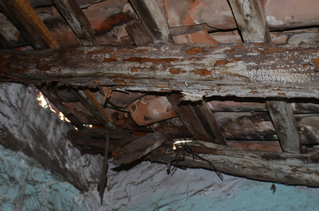 Roof of house deteriorated by abandonmentの写真素材