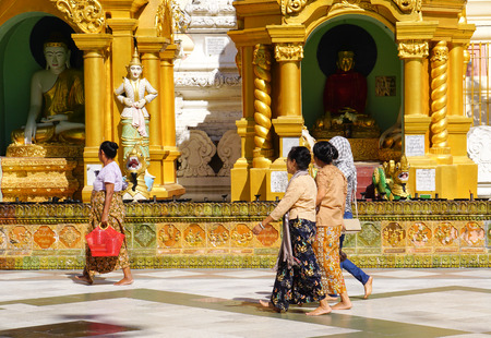 YANGON, MYANMAR - JAN 14, 2015: The atmosphere of Shwedagon Pagoda in Yangon, Myanmar. Shwedagon Pagoda is the most sacred Buddhist pagoda for the Burmese.のeditorial素材