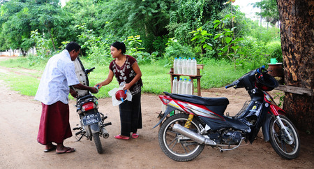 BAGAN, MYANMAR - FEBRUARY 23, 2015. Rural petrol station in Bagan, Myanmar.のeditorial素材