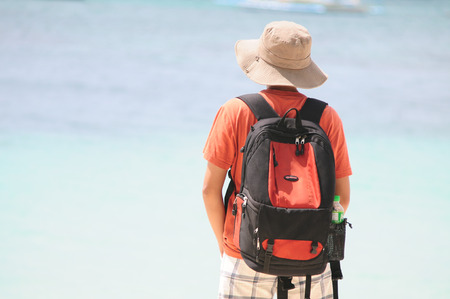 Boracay, Philippines - Feb 1, 2015. Tourists and traditional boat at White beach, Boracay Island, Philippines.のeditorial素材