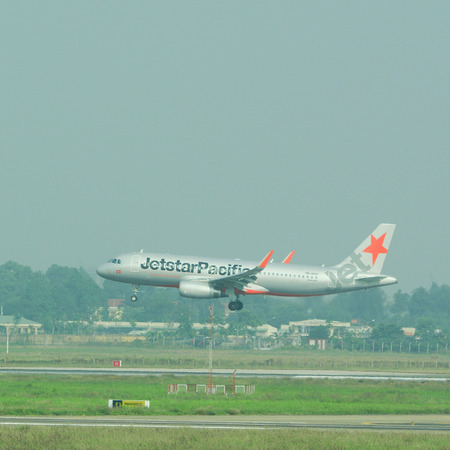 HO CHI MINH, VIETNAM - MAR 15, 2015. Civil aircrafts parking at Tan Son Nhat International airport...