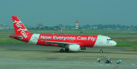 HO CHI MINH, VIETNAM - MAR 15, 2015. Civil aircrafts parking at Tan Son Nhat International airport...