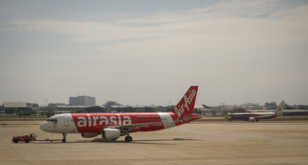 BANGKOK, THAILAND - MAR 15, 2015. Civil aircrafts parking at Don Muang International airport in Bangkok, Thailand. It is the second largest international airport in Thailand.のeditorial素材