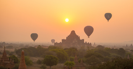 Scenic sunrise at Bagan, Myanmar. The Bagan Archaeological Zone is a main draw for the country's nascent tourism industry. It is seen by many as equal in attraction to Angkor Wat in Cambodia.の写真素材