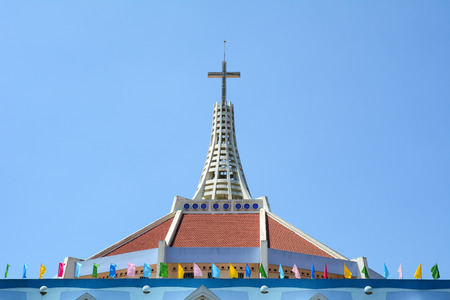 BAO LOC, VIETNAM - MAR 26, 2015: Top of old beautiful church on summer's day in Bao Loc, Vietnam. Bao Loc is city of Lam Dong highland province in Vietnam.の写真素材