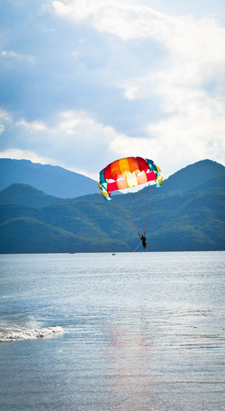 Parasailing in the Bay of Nha Trang. It is one of the most popular fishing, sailing and tourist destinations in southern Vietnam.の写真素材