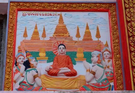 Carved in stone demons, gods and spirits - decoration of Khmer temple in Mekong Delta, southern Vietnam.の写真素材