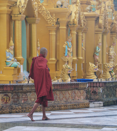 YANGON, MYANMAR - JAN 14, 2015: People visiting at Shwedagon Pagoda in Yangon, Myanmar. Shwedagon Pagoda is the most sacred Buddhist pagoda for the Burmese.のeditorial素材