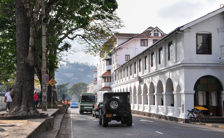 KANDY, SRI LANKA - MARCH 25, 2015. People and vehicles on Kandy street, Sri Lanka. Kandy is famous because of its Tooth Relic Temple where Buddha's tooth is being kept.のeditorial素材