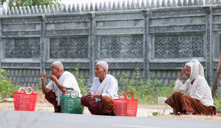 Mekong Delta, Vietnam - Mar 12, 2011. Unidentified Khmer women with traditional dress waiting for the bus in An Giang, southern Vietnam.のeditorial素材
