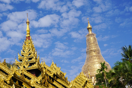 Top of golden stupa at Shwedagon Paya Pagoda in Yangon, Myanmar.の写真素材