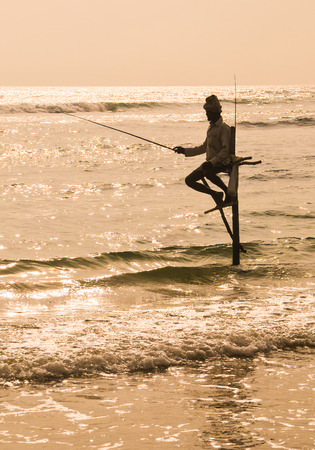 Hikkaduwa Sri Lanka  Feb 1 2012. Stilt Fishermen of Sri Lanka. Stilt fishing is a method of fishing unique to the island country of Sri Lanka located off the coast of India.のeditorial素材