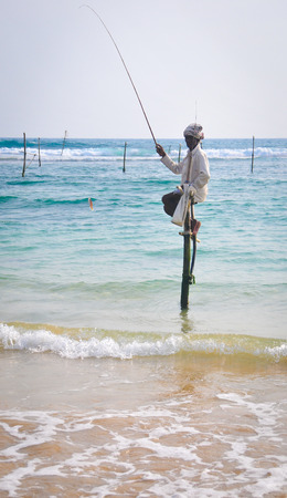 Hikkaduwa Sri Lanka  Feb 1 2012. Stilt Fishermen of Sri Lanka. Stilt fishing is a method of fishing unique to the island country of Sri Lanka located off the coast of India.のeditorial素材