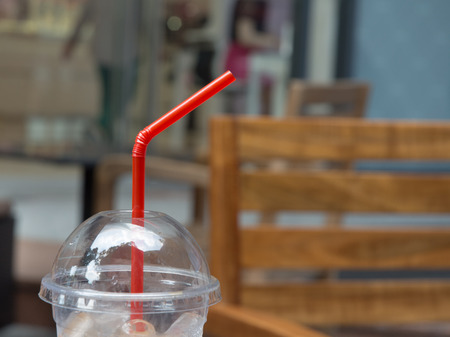 Iced coffee in takeaway cup の写真素材