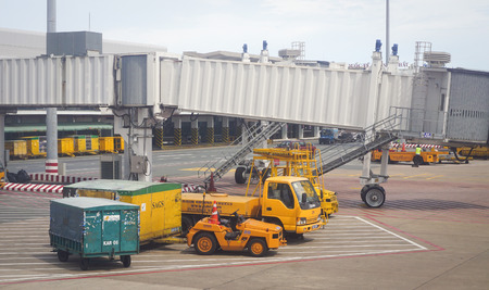 HO CHI MINH, VIETNAM - JUL 2, 2015. Civil aircrafts parking at Tan Son Nhat International airport in Saigon (Ho Chi Minh city), Vietnam. It is the international airport in southern Vietnam.のeditorial素材