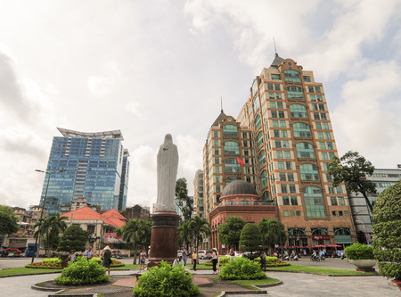 SAIGON, VIETNAM - MAY 28, 2015. Vehicles on treet in Saigon downtown. Saigon is the biggest city in Vietnam. It was the capital of Republic of Vietnam.のeditorial素材