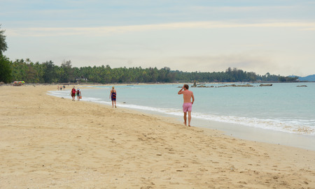 Ngapali, Myanmar - Jan 16, 2015. Tourists enjoying on beautiful beach in Ngapali on the west coast (Bengal Bay) of Myanmar (Burma).のeditorial素材