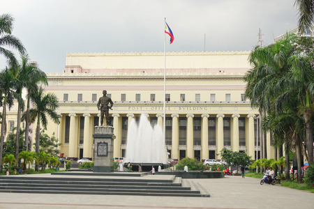 MANILA, PHILIPPINES - APRIL 22, 2015. The facade of Manila Post Office. The construction of this building started in 1936 and was finished before the outbreak of war in 1941.のeditorial素材