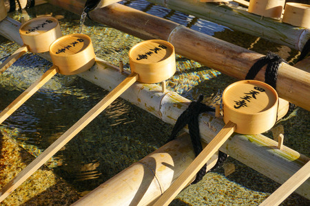 NARA, JAPAN - AUG 30, 2015. Water dippers at Todaiji in Nara, Japan. Water used for washing hands and mouth before into temple.のeditorial素材