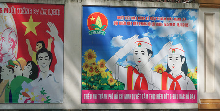 HO CHI MINH CITY - AUG 23, 2015. Communist propaganda signs in Saigon (Ho Chi Minh city), Vietnam. Only political organizations affiliated with the Communist Party are permitted to contest elections.のeditorial素材