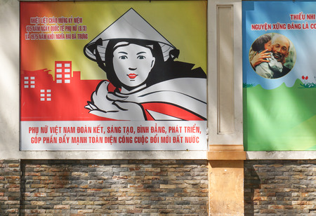 HO CHI MINH CITY - AUG 23, 2015. Communist propaganda signs in Saigon (Ho Chi Minh city), Vietnam. Only political organizations affiliated with the Communist Party are permitted to contest elections.のeditorial素材