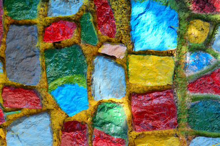 Colorful stone block wall in sunny day.の写真素材
