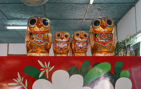 KOLKATA, INDIA - JUL 23, 2014. Paper owls, artworks of handicraft, on display during Handicraft Fair in Kolkata - the biggest handicrafts fair in Asia.のeditorial素材