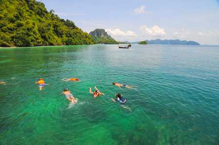 Krabi, Thailand - Sep 2, 2015. Tourists snorkeling in a tropical clear sea in Krabi, Thailand. Kayaking, sailing, bird watching, snorkeling are also among top activities in Krabi and Phuket.のeditorial素材