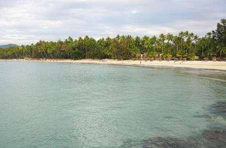 Ngapali, Myanmar - Jan 17, 2015. Beautiful beach resort with many coconut trees in Ngwesaung Beach on the west coast (Bengal Bay) of Myanmar (Burma).のeditorial素材
