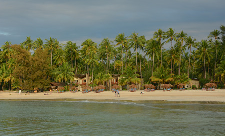 Ngapali, Myanmar - Jan 17, 2015. Beautiful beach resort with many coconut trees in Ngwesaung Beach on the west coast (Bengal Bay) of Myanmar (Burma).のeditorial素材