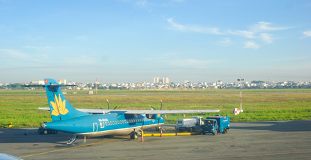 HO CHI MINH, VIETNAM - MAR 15, 2015. Civil aircrafts parking at Tan Son Nhat International airport...