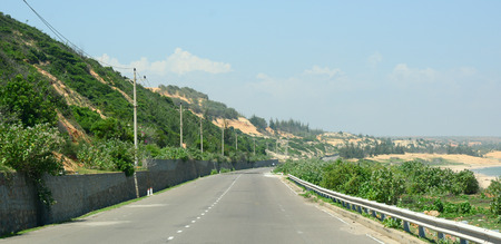 Nha Trang, Vietnam - Apr 20, 2015. View of the highway from Nha Trang to Dalat in Vietnam. The total length of the Viet Nam road system is about 222,179 km.のeditorial素材