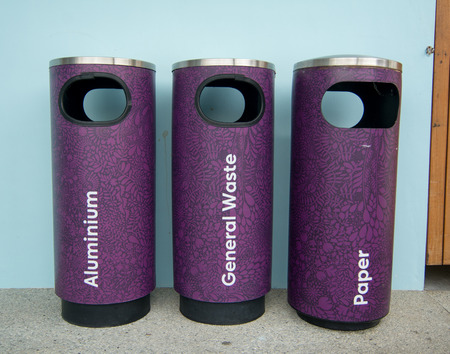 SINGAPORE - JUNE 18, 2015. Metal recycle bin on pathway in Singapore. Singapore literally does not waste a single drop of water if it can be helped.のeditorial素材