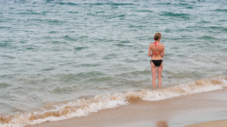 Nha Trang, Vietnam - Oct 10, 2015. Tourists enjoying on Nha Trang beach. Nha Trang is a coastal city in Vietnam, famous with beautiful beaches and bays.のeditorial素材